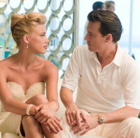Chenault (Amber Heard) and Paul (Johnny Depp) - THE RUM DIARY